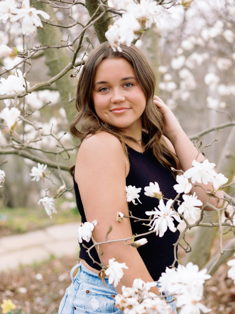 Senior Picture with flowering tree at Newfields by Indianapolis Senior Photographer Monette Wagner